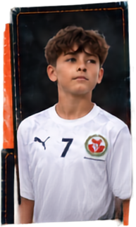 Portrait photo, styled as a graded trading card, used to illustrate a player’s first Emblem card